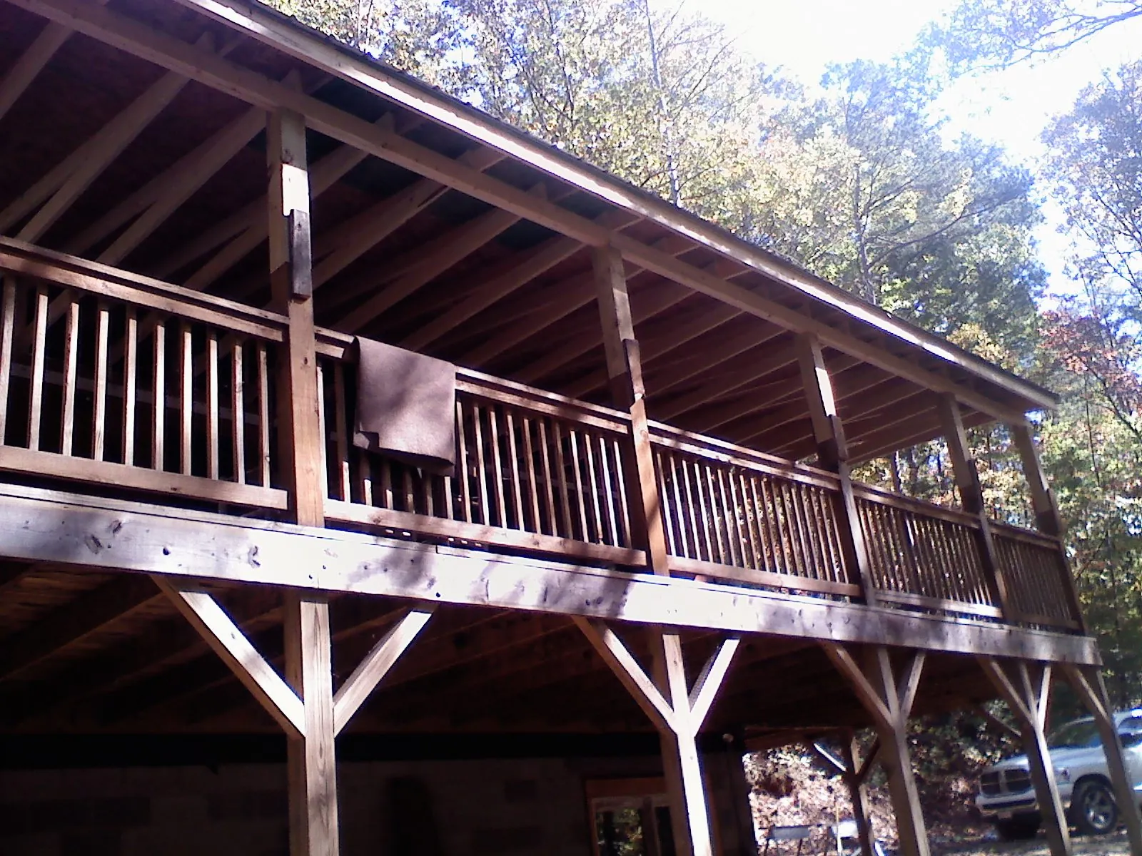Timber framing under a new elevated porch and deck — Roof Leak Repair in Winchendon by Roofing Brothers